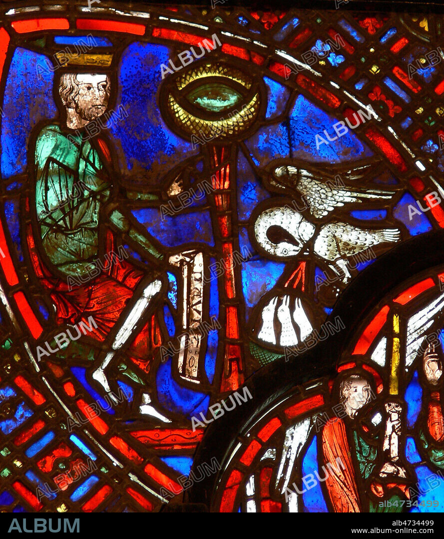 Le roi David face au pelican qui nourrit ses enfants avec ses propres entrailles (symbole du sacrifice du Christ). Vitrail de la cathedrale du Mans datant du 13e s (XIIIe, 13eme). Photographie par Painton Cowen. Credit : COWEN/KHARBINE-TAPABOR.