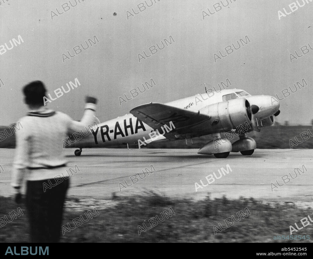 Soon To Fly Ocean -- The $60,000 Monoplane of Capt. Alex Papana, Rumanian ace aviator, is shown as it Landed at Floyd bennett Airport with papana at the controls after a flight from Detroit, Mich. Papana will attempt a nonstop flight from here, across the ocean, to Bucharest, Rumania. He Expects to make the flight in 32 Hours. It will be A "Good will Flight," Sponsored by the Rumania Government. Papana will fly the plane to Hartford conn. , for a final checkup on the motors Before taking off on the ocean hop. July 18, 1938. (Photo by International News Photos).