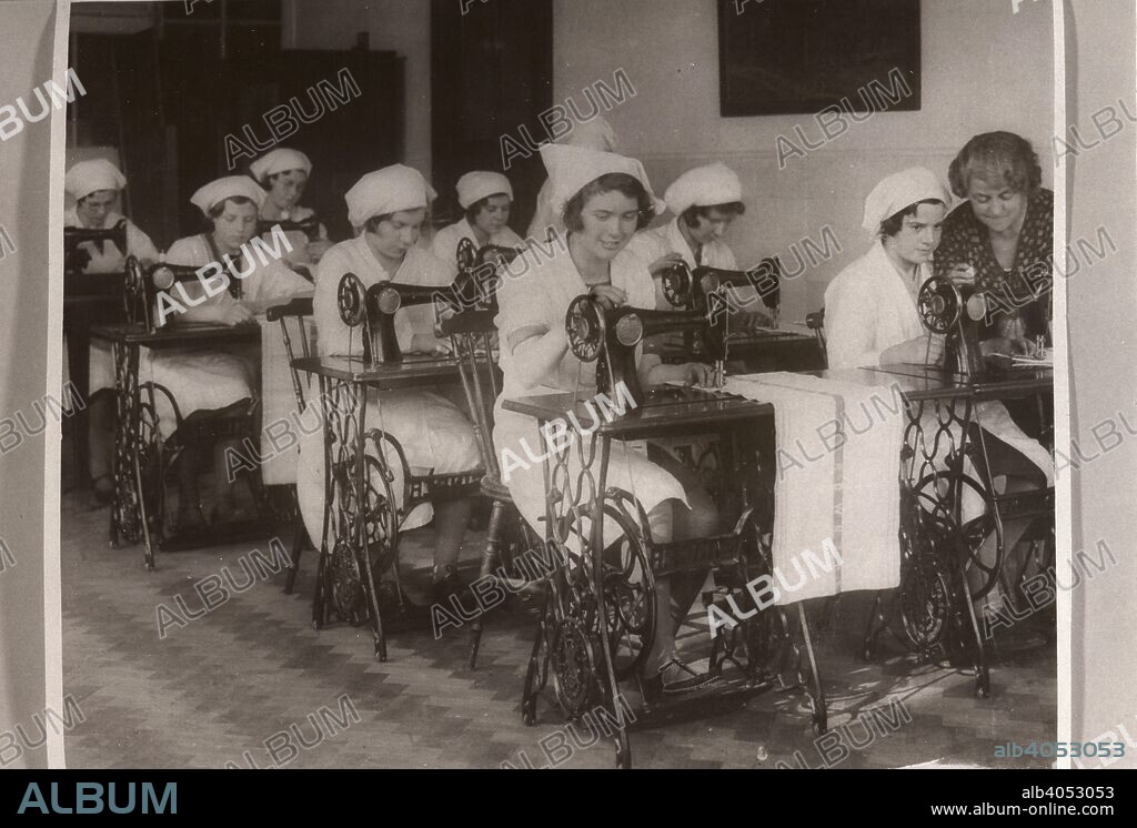 Girls in sewing class using sewing machines, Rowntree factory, York, Yorkshire, 1932.