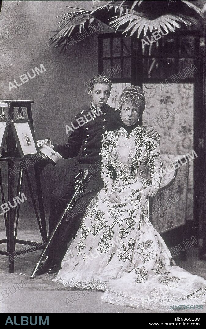 Alfonso XIII of Spain with his mother Maria Christina of Austria, 1900.