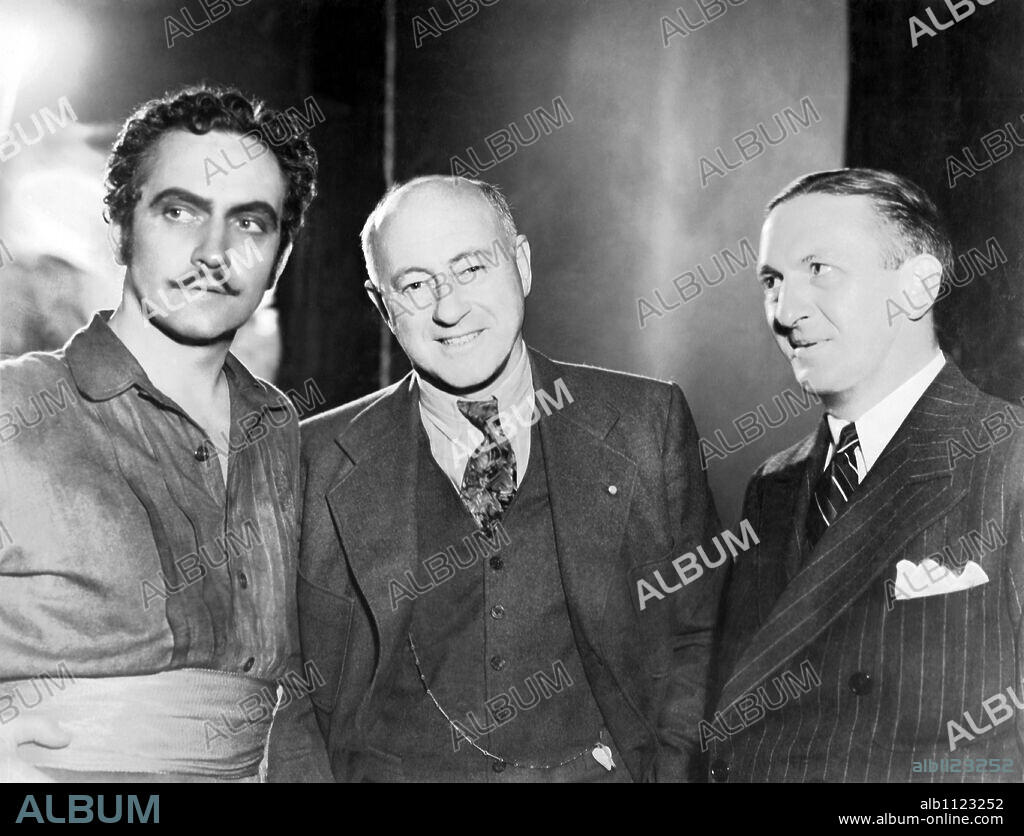 CECIL B DEMILLE and FREDRIC MARCH in THE BUCCANEER, 1938, directed by CECIL B DEMILLE. Copyright PARAMOUNT PICTURES.