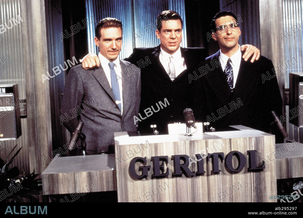 CHRISTOPHER McDONALD, JOHN TURTURRO and RALPH FIENNES in QUIZ SHOW, 1994, directed by ROBERT REDFORD. Copyright HOLLYWOOD PICTURES / WETCHER, BARRY.