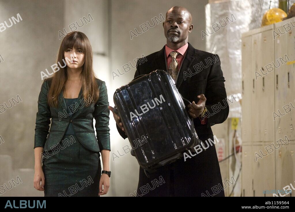 CAMILLA BELLE and DJIMON HOUNSOU in PUSH, 2009, directed by PAUL MCGUIGAN. Copyright INFINITY FEATURES ENTERTAINMENT/ICON PRODUCTIONS.