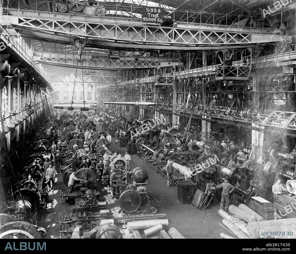 Entitled: "Krupp gun factory number 1, in Essen, Germany in 1917." The Krupp family, a prominent 400 year old German dynasty from Essen, have become famous for their production of steel, artillery, ammunition, and other armaments. Friedrich Krupp built a pioneering steel foundry in Essen in 1810. His son Alfred invested heavily in new technology to become a significant manufacturer of steel rollers and railway tires. He also invested in the revolutionary Bessemer process and acquired many mines in Germany and France. The company began to make steel cannons in the 1840s. Low non-military demand and government subsidies meant that the company specialized more and more in weapons: by the late 1880s the manufacture of armaments represented around 50% of Krupp's total output. At the time Krupp's was the world's largest industrial company and the largest private company in the German empire. When Adolf Hitler came to power in Germany in 1933, the Krupp works became the center for German rearmament. The choices of the Krupp family and firm during the Nazi era, including support of Hitler and use of forced labour, are part of the legacy. Bain News Service, 1917.