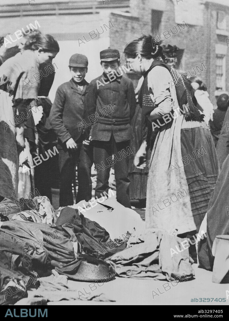 Woman Selling Old Clothes on the Rag Market.