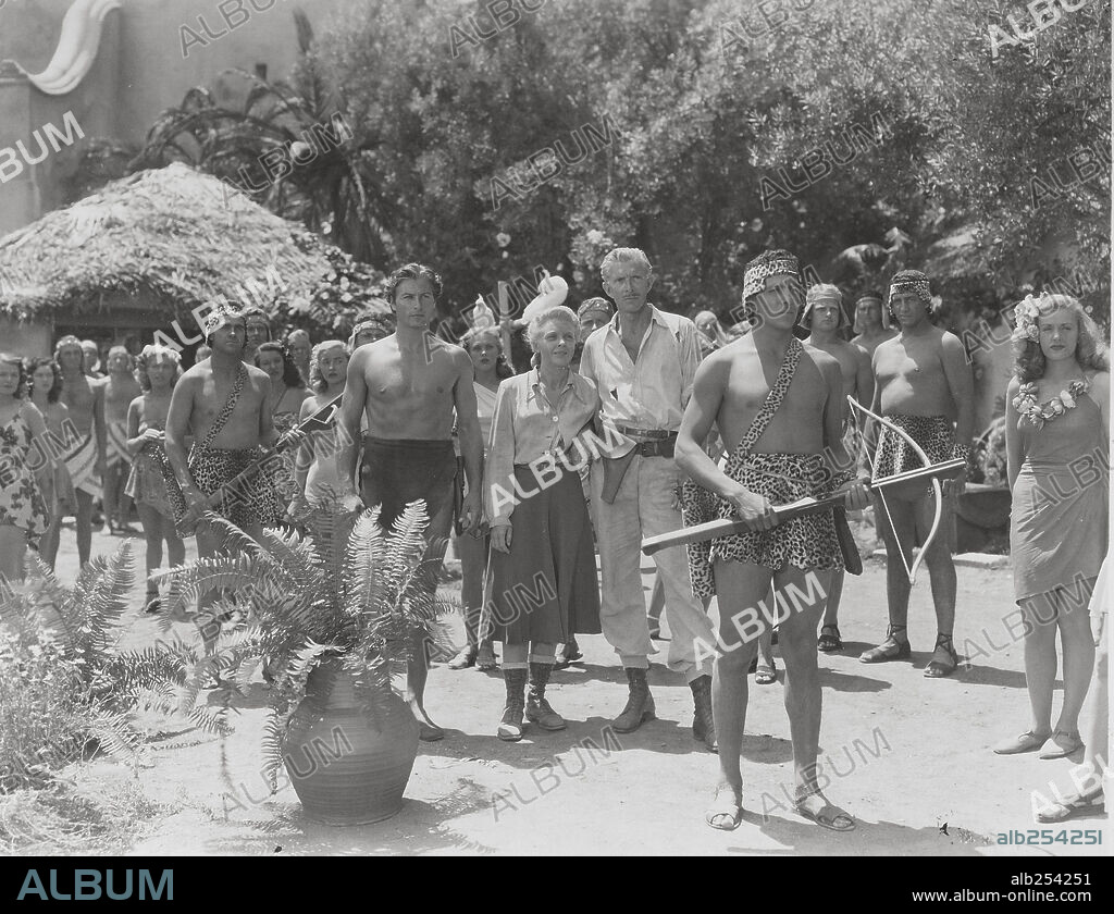 ALAN NAPIER and LEX BARKER in TARZAN'S MAGIC FOUNTAIN, 1949, directed by LEE SCHOLEM. Copyright RKO.