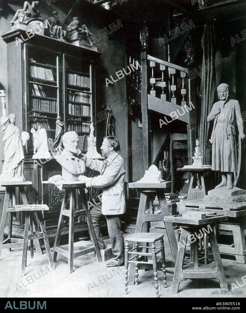 Bartholdi in his studio. FrÃ©dÃ©ric Auguste Bartholdi (August 2, 1834 - October 4, 1904) was a French sculptor. He attended the Lycee Louis-le-Grand in Paris, and received a BA in 1852. He then went on to study architecture at the Ã‰cole nationale supÃ©rieure des Beaux-Arts as well as painting under Ary Scheffer in his studio in the Rue Chaptal. Later, he turned his attention to sculpture, which afterward exclusively occupied him. The work for which Bartholdi is most famous is Liberty Enlightening the World, better known as the Statue of Liberty. Before starting his commission, Bartholdi had traveled to the United States and personally selected Bedloe's Island in New York Harbor as the site for the statue. The United States agreed to responsibility for funding the building of the pedestal, with about $300,000 being raised. In October 1886, the structure was officially presented both to the nation and to all aspirers to liberty within the world, as the joint gift of the French and American people. He died of tuberculosis in 1904 at the age of 70. No photographer credited, undated.