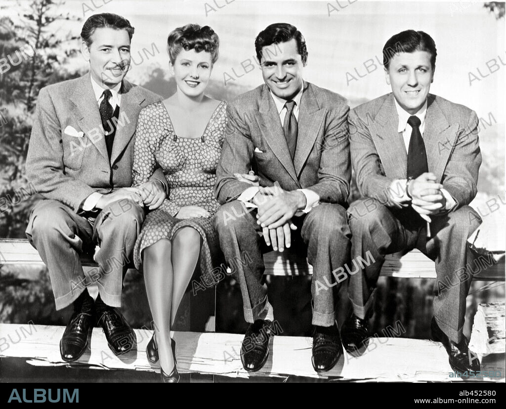 CARY GRANT, GEORGE STEVENS, JEAN ARTHUR and RONALD COLMAN in THE TALK OF THE TOWN, 1942, directed by GEORGE STEVENS. Copyright COLUMBIA PICTURES.