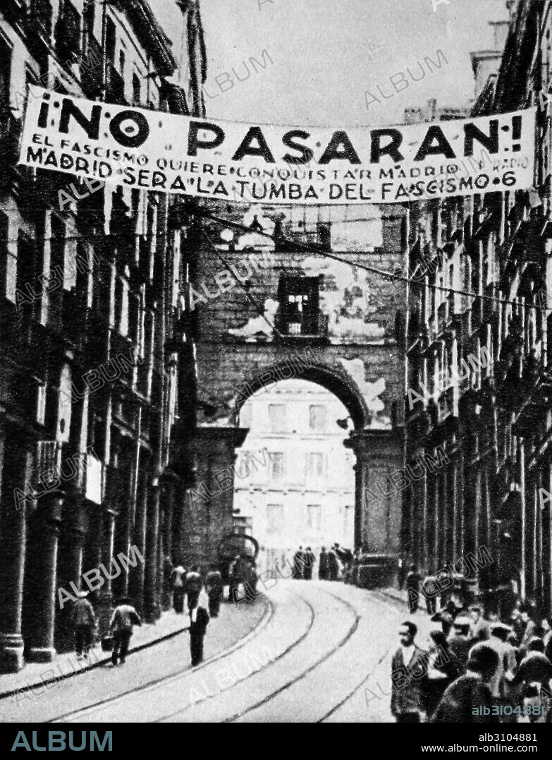 Spanish Civil War: republican banner above a Madrid street reads ' No Passaran! (They shall not pass). Below is stated: Madrid sera la tumba del fascismo (Madrid will be the tomb of fascism), 1937.