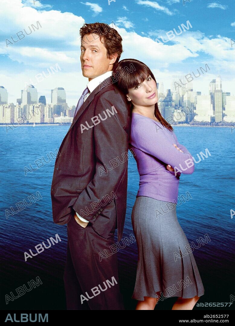 HUGH GRANT and SANDRA BULLOCK in TWO WEEKS NOTICE, 2002, directed by MARC LAWRENCE. Copyright WARNER BROS. PICTURES.