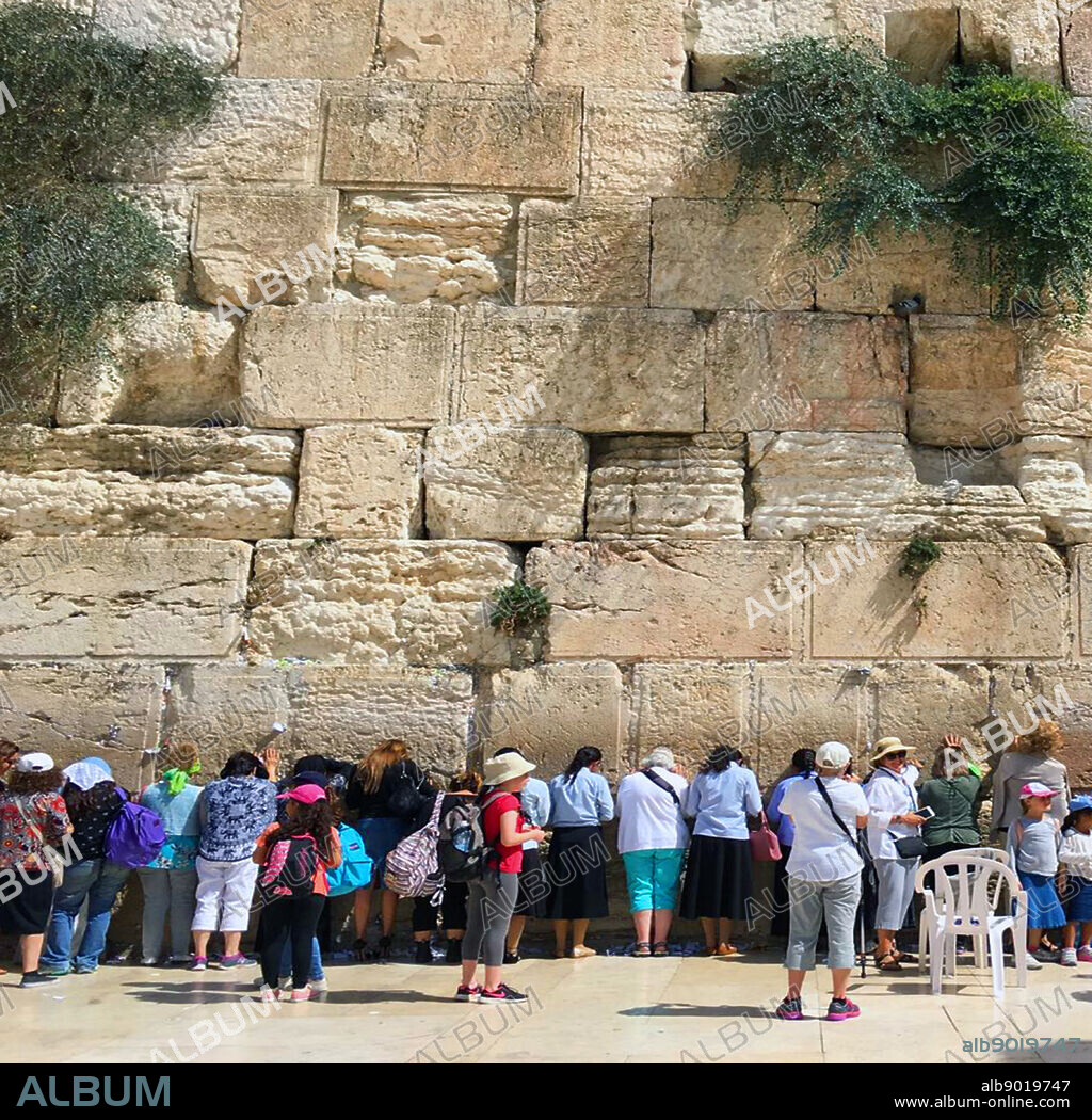 The Western Wall, Wailing Wall or Kotel; an ancient limestone wall in the Old City of Jerusalem, Israel. The wall was originally erected as part of the expansion of the Second Jewish Temple by Herod the Great.
