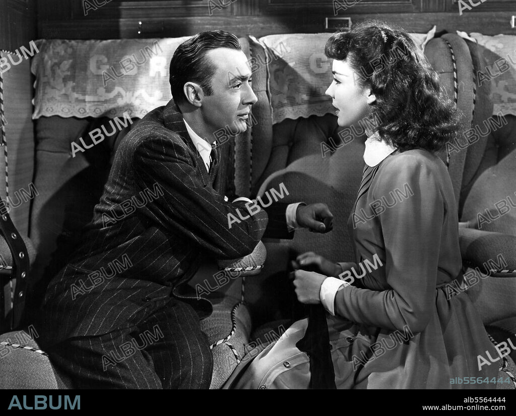 CHARLES BOYER and JENNIFER JONES in CLUNY BROWN, 1946, directed by ERNST LUBITSCH. Copyright 20TH CENTURY FOX.