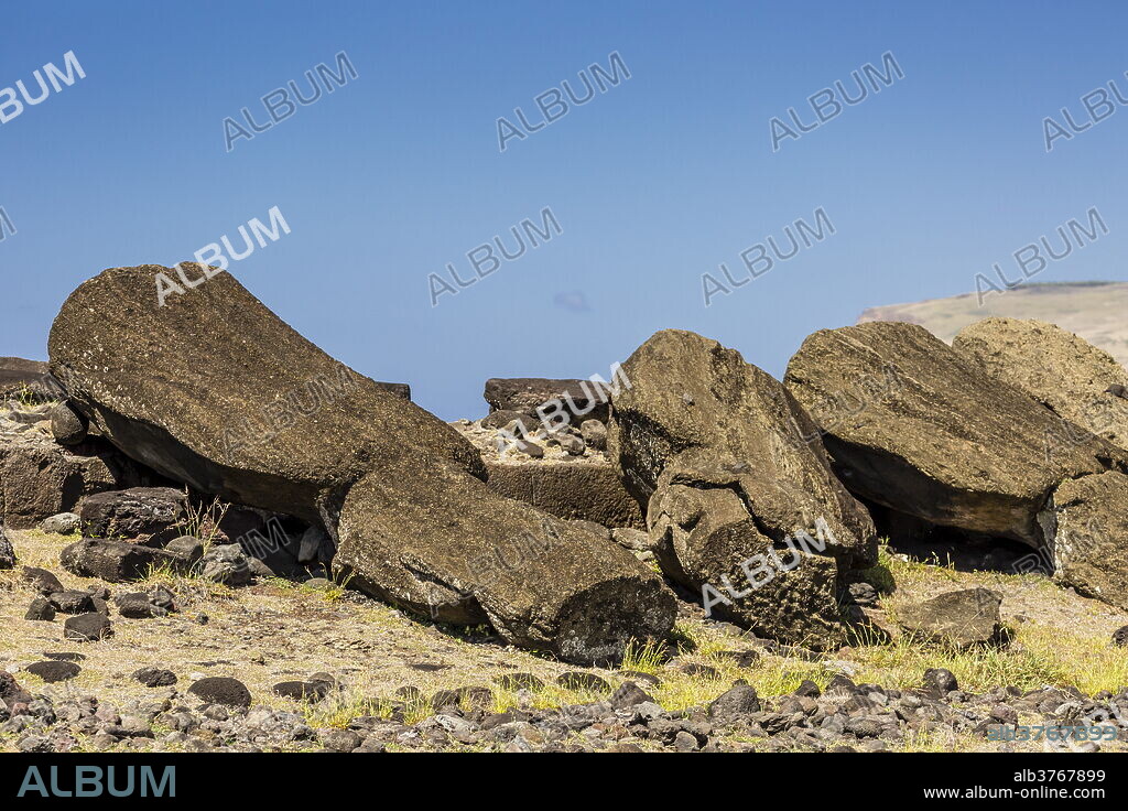 Fallen moai at Ura Uranga Te Mahina ceremonial site on Easter Island (Isla de Pascua) (Rapa Nui), UNESCO World Heritage Site, Chile, South America.