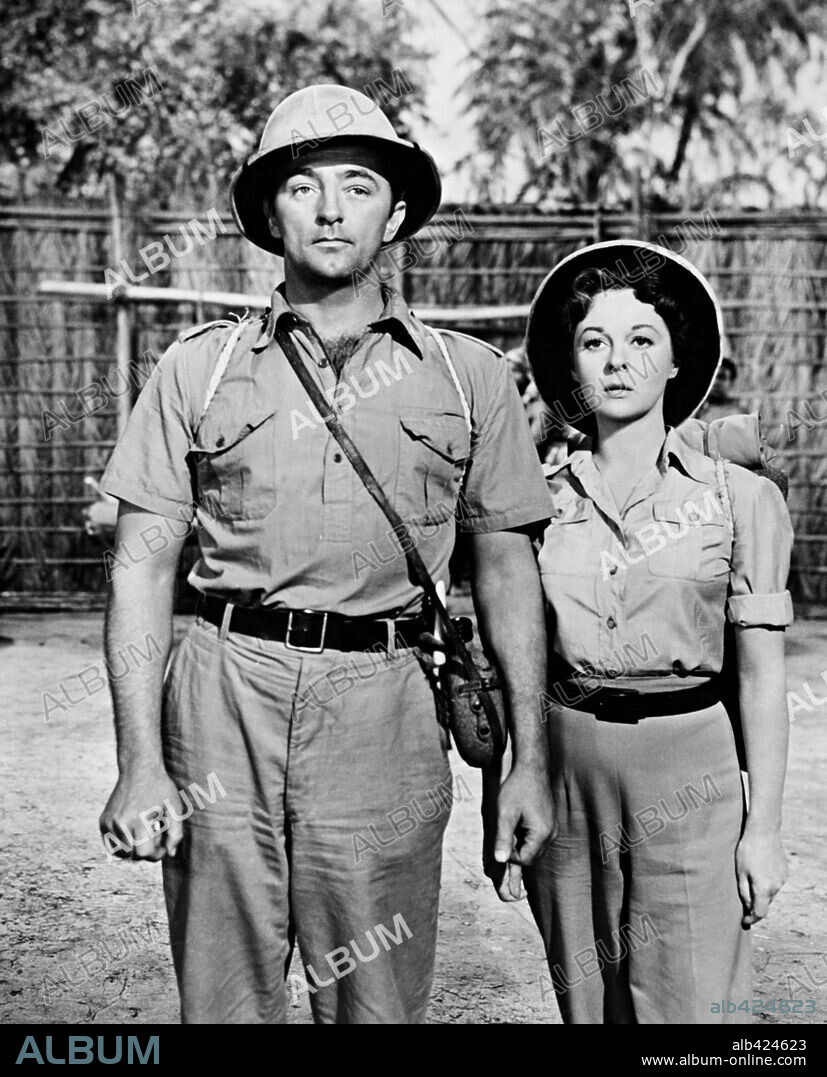 ROBERT MITCHUM y SUSAN HAYWARD en LA HECHICERA BLANCA, 1953 (WHITE WITCH DOCTOR), dirigida por HENRY HATHAWAY. Copyright 20TH CENTURY FOX.