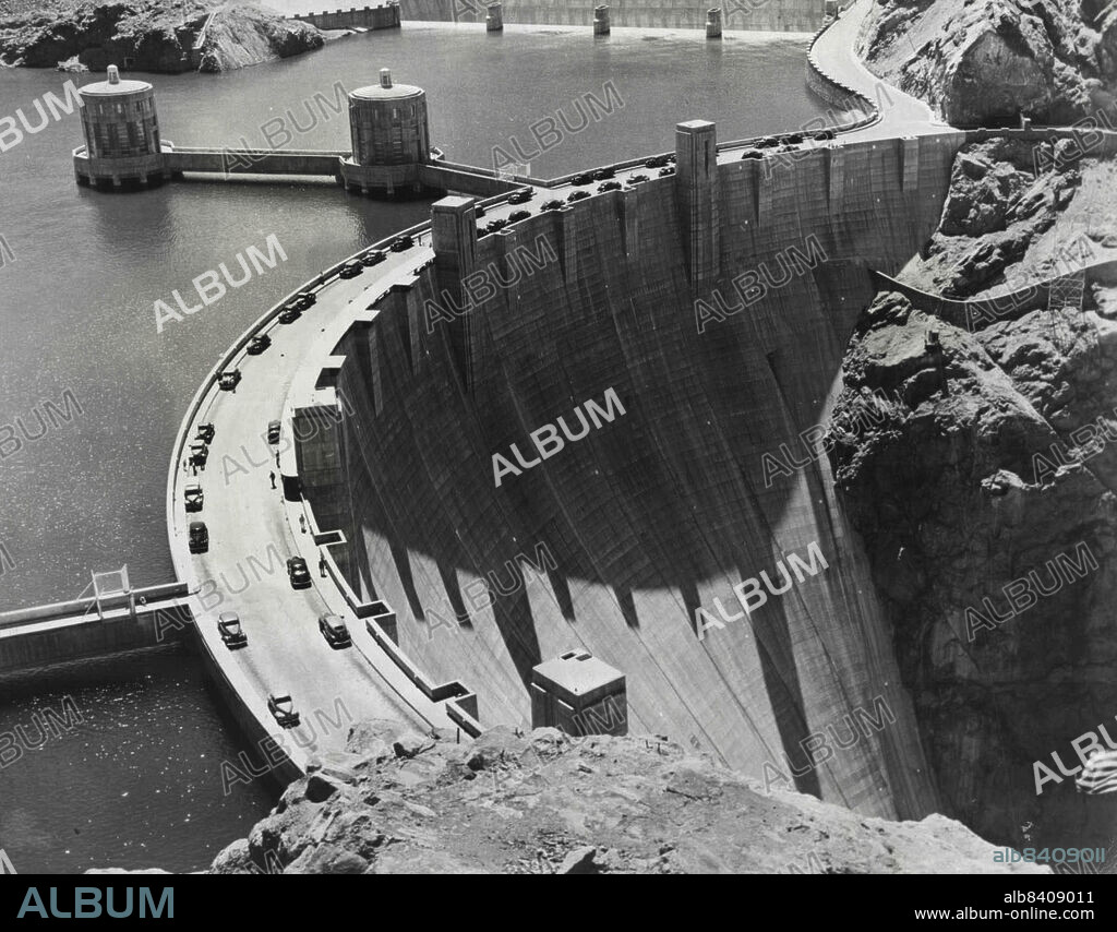 Henry J. Kaiser, 'Miracle Builder', Starts Work On Giant Cargo Planes -- The highest dam ever built by man, Boulder Dan, saves the turbulent waters of the Colorado river for irrigating thousands of acres of desert land and for turning electric generators to supply power for the U.S. war effort. As president of the Six ***** panies that built Boulder, Henry J. Kaiser got his start as a ***** production and engineering expert, began his climb to fame by accomplishing the seemingly impossible feat of completing the ***** 18 months ahead of schedule. November 26, 1942.