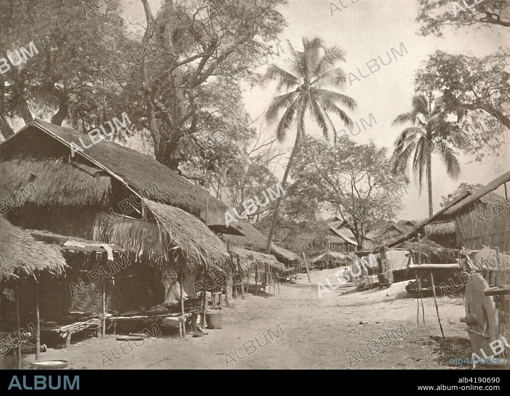 'A Typical Burmese Village Scene', 1900. From "Typical Photographs of Burma - Burmese Life and Scenes". [Rowe & Co. Ltd., Rangoon, 1900].