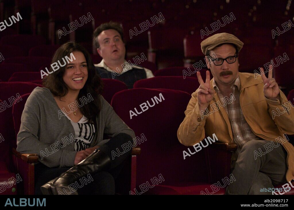 MICHELLE RODRIGUEZ and ROB SCHNEIDER in INAPPROPRIATE COMEDY (2013), directed by VINCE OFFER. Copyright SQUAREONE ENTERTAINMENT.