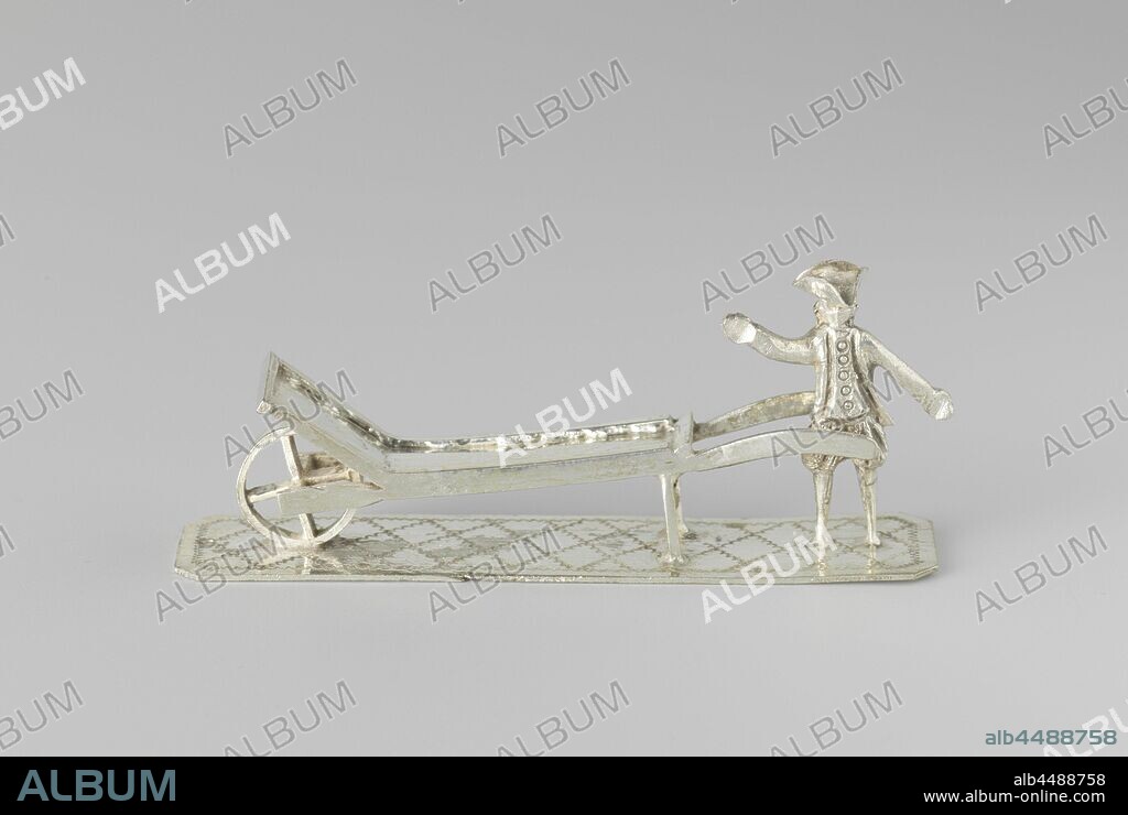 Man with wheelbarrow, On an elongated plate, engraved with a diamond pattern, stands a man behind a wheelbarrow. The man is wearing shorts and a stitch. His right hand is raised. The image is marked with a dolphin and a master's mark., Wheelbarrow, W. Freen, Dordrecht, c. 1856 - c. 1858, silver (metal), l 8.5 cm × h 3.5 cm × w 2.1 cm × w 32.70 gr.