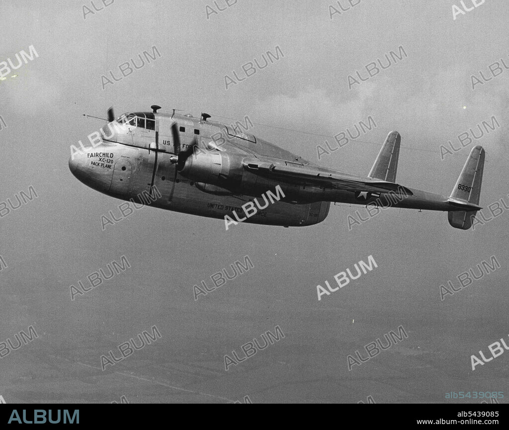 First photograph of the revolutionary new Fairchild XC-120 Packplane in flight over the Fairchild Aircraft Division plant in Hagerstown, Md. On its maiden flight, the new Air Force cargo plane did not detach its cargo-carrying fuselage. October 01, 1950. (Photo by Dan Frankforter, Fairchild Aircraft).;First photograph of the revolutionary new Fairchild XC-120 Packplane in flight over the Fairchild Aircraft Division plant in Hagerstown, Md. On its maiden flight, the new Air Force cargo plane did.