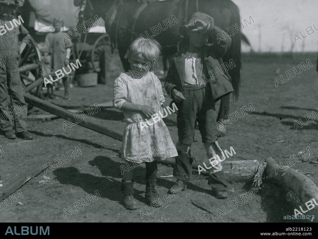Four year old cotton picker who picks fifteen pounds a day regularly and seven year old who picks fifty pounds a day. They live in emigrant wagons. Moving about from farm to farm.