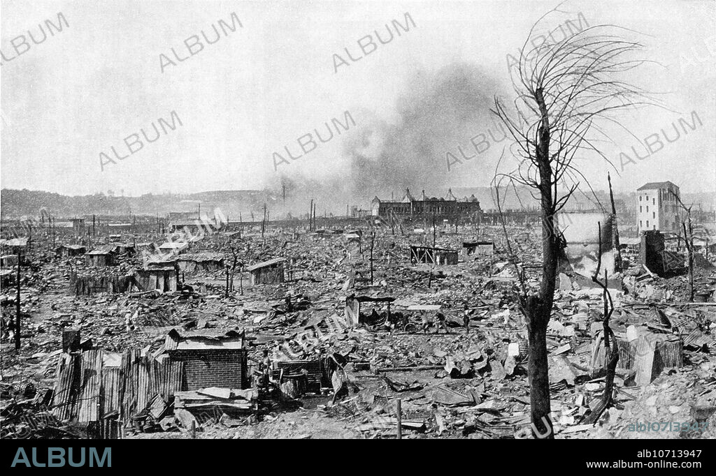 [ 1890s Japan - Great Kanto Earthquake , Yokohama ] Devastation caused in Yokohama by the Great Kanto Earthquake (Kanto Daishinsai) of September 1, 1923. Some simple shelters have been erected by survivors. The quake, with an estimated magnitude between 7.9 and 8.4 on the Richter scale, devastated Tokyo, the port city of Yokohama, surrounding prefectures of Chiba, Kanagawa, and Shizuoka, and claimed over 140,000 victims. 20th century vintage magazine illustration.