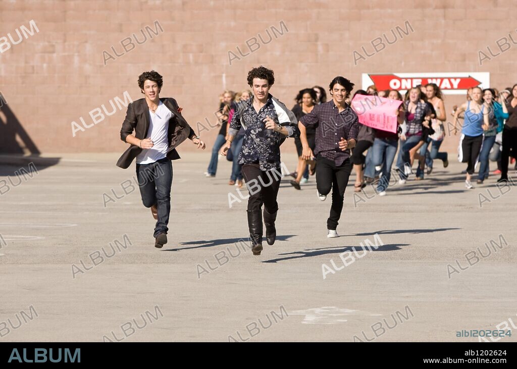 JOE JONAS, KEVIN JONAS and NICK JONAS in JONAS BROTHERS: THE 3D CONCERT EXPERIENCE, 2009, directed by BRUCE HENDRICKS. Copyright Chapman-leonard studio equipment/ film source/ / EMERSON, SAM.