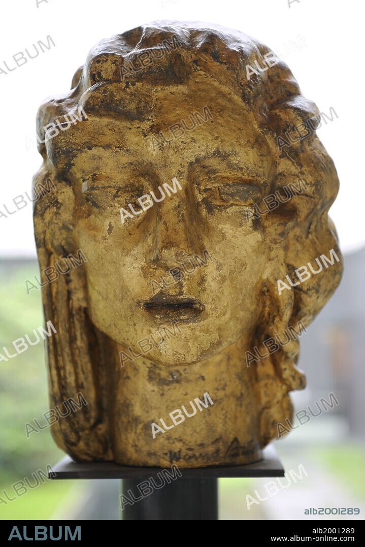 WÄINÖ AALTONEN. Waino Aaltonen (1894 - 1966). "Woman's Head". Gilded bronze. Turku City Art Collection.