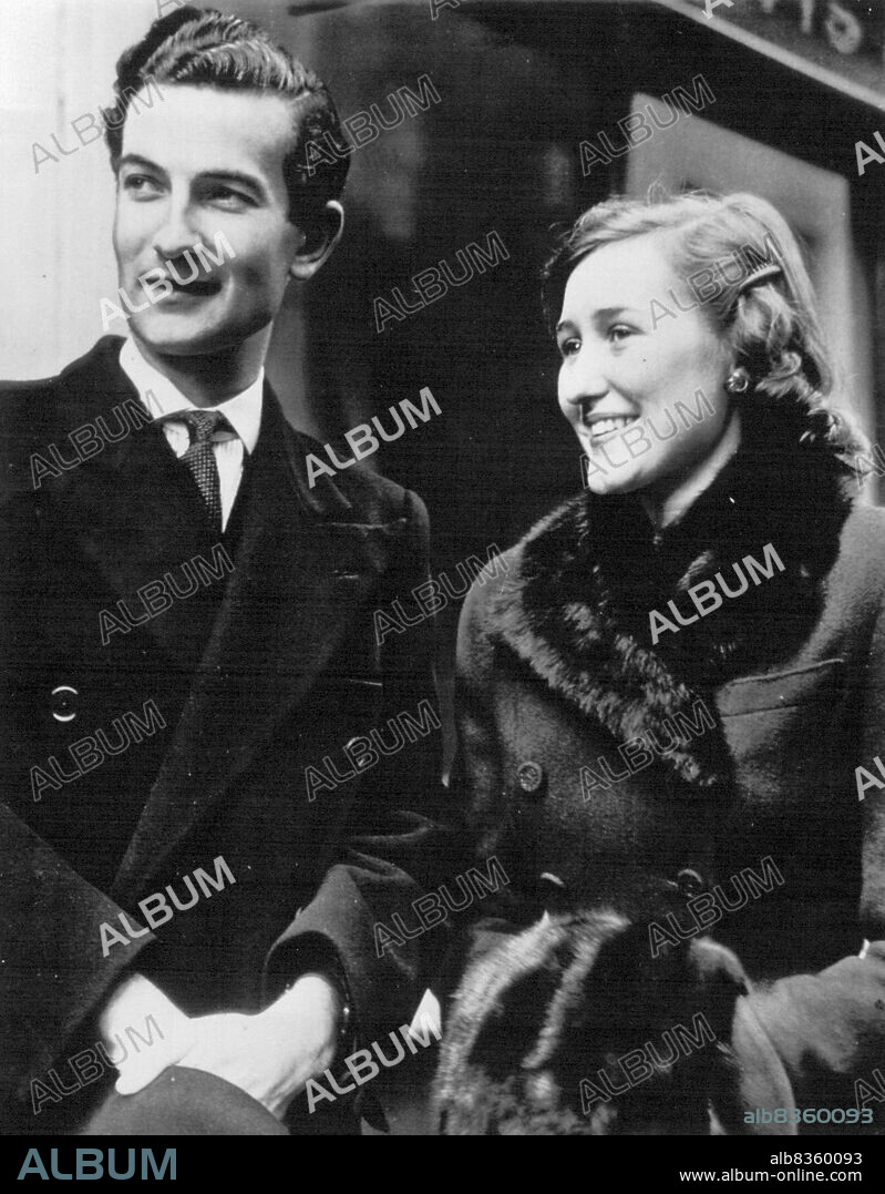 Anglo-American Romance-Miss Leslie Nast, 18-year-old daughter of the late Conde Nast, American publisher, and her fiancee, Lord St. Just (Peter George Grenfell), 26, are shown in London, Tuesday, after the announcement of their engagement. Miss Nast is the Stepdaugthter of Col. Rex Benson, former British military attache in Washington. Lord St. Just is the son of the late Edward Grenfell, the banker, who died in 1941. They plan to marry in April. January 27, 1949. (Photo by AP Wirephoto).
