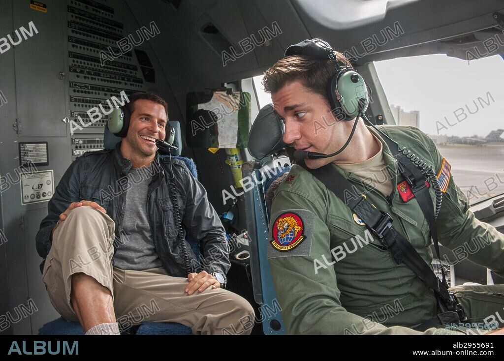 BRADLEY COOPER and JOHN KRASINSKI in ALOHA, 2015, directed by CAMERON CROWE. Copyright COLUMBIA PICTURES/REGENCY ENTERPRISES/LSTAR CAPITAL/SCOTT RU.
