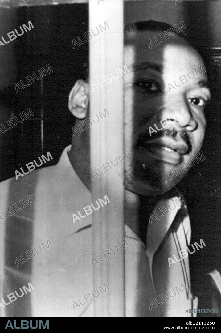MARTIN LUTHER KING BEHIND CELL BARS IN ST AUGUSTINE, FLORIDA / ;. 12 JUNE 1964.