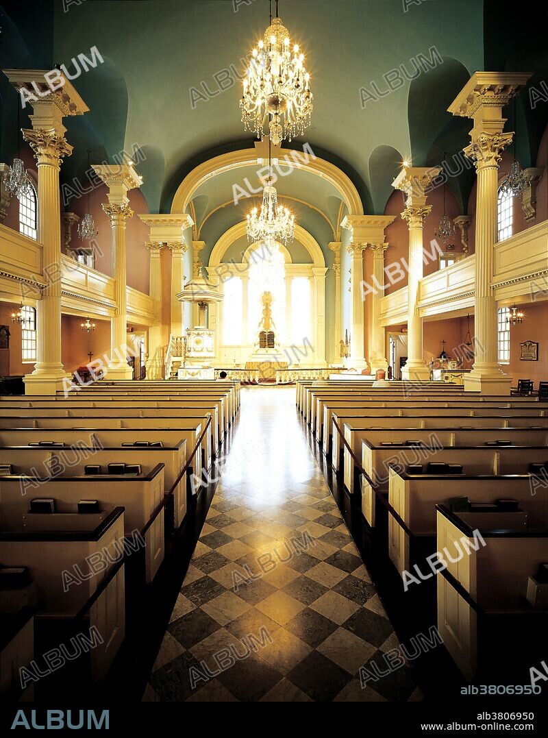 Interior view of Saint Paul's Chapel at 209 Broadway, in lower Manhattan. George Washington worshipped here, and there is a pew dedicated to him. Saint Paul's is a Chapel of the parish of Trinity Church. Located next to the World Trade Center, it escaped damage on 9/11 and served as place of rest and refuge during the rescue work. There are exhibits in the church that document the church during the event.