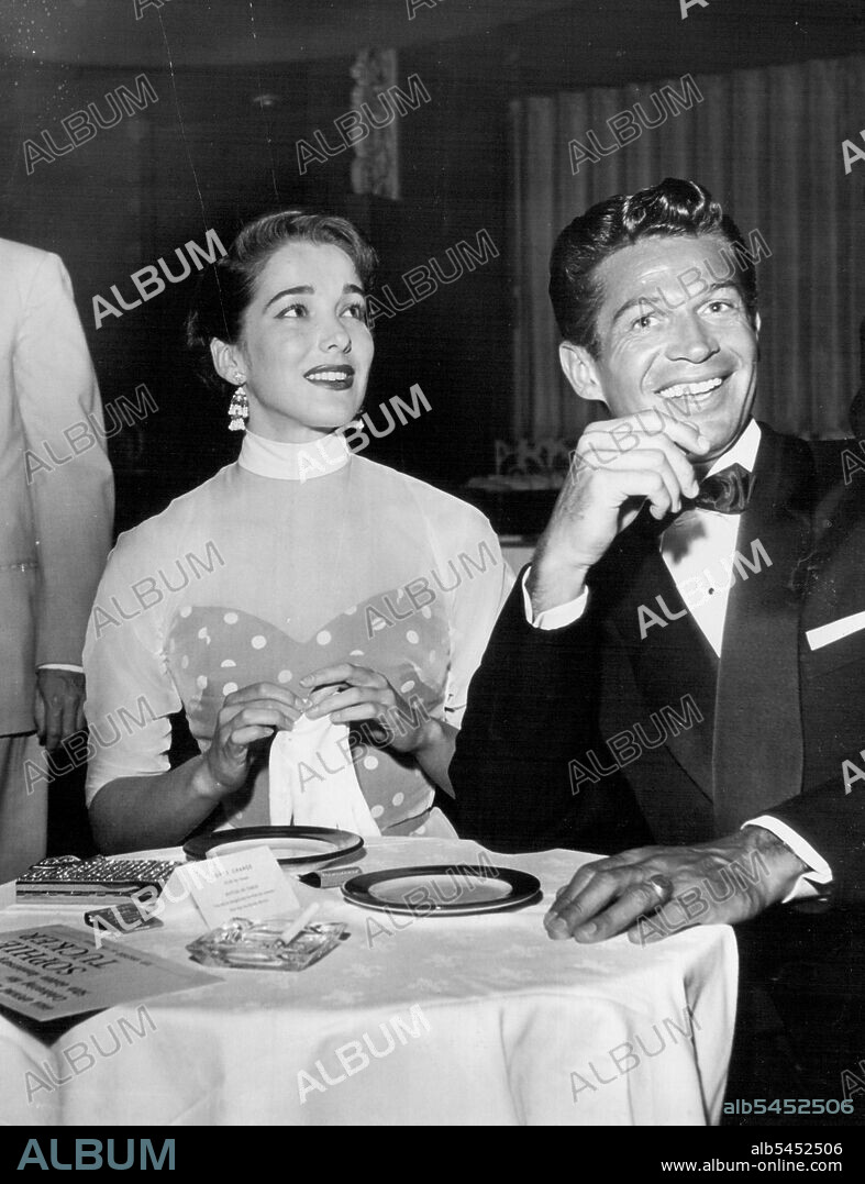 Julie Adams, George Nader. June 17, 1955. (Photo by Jay Scott).