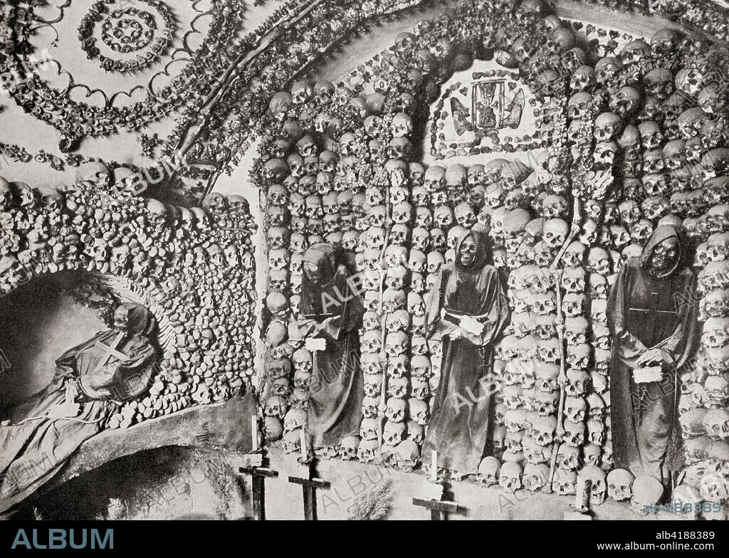 The Capuchin Crypt, a small space comprising several tiny chapels located beneath the church of Santa Maria della Concezione dei Cappuccini on the Via Veneto, Rome, Italy, lined with the skeletal remains of 3,700 bodies believed to be Capuchin friars.  From The Wonders of the World, published c.1920.