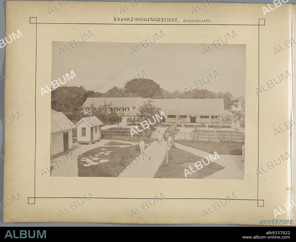 Insane asylum, courtyard (title on object), The insane asylum Wolfenbüttel, near Paramaribo., Julius Muller, C.J. Chapman, Suriname, 1898 - 1902, albumen print, height 181 mm × width 259 mm × height 297 mm × width 437 mm.