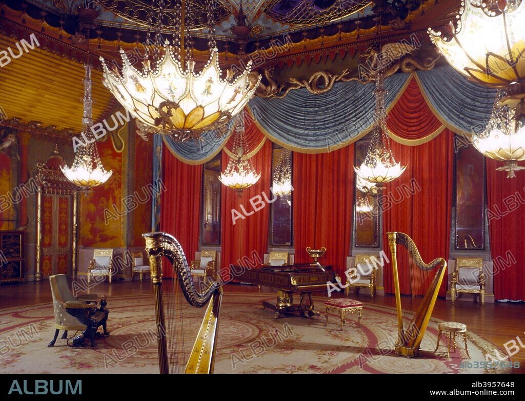 The Music Room, Royal Pavilion, Brighton, East Sussex, 1960s. The Pavilion was originally built in 1786-1787 by Henry Holland for King George IV (1762-1830), then Prince Regent. It was added to by William Porden in 1804-1806 and remodelled by John Nash between 1815 and 1822 in a European interpretation of Indian and Chinese architectural styles. The Music Room is decorated in red and gold 'chinoiserie' style with dragons. It was badly damaged by a fire in 1975 but has since been lovingly restored.