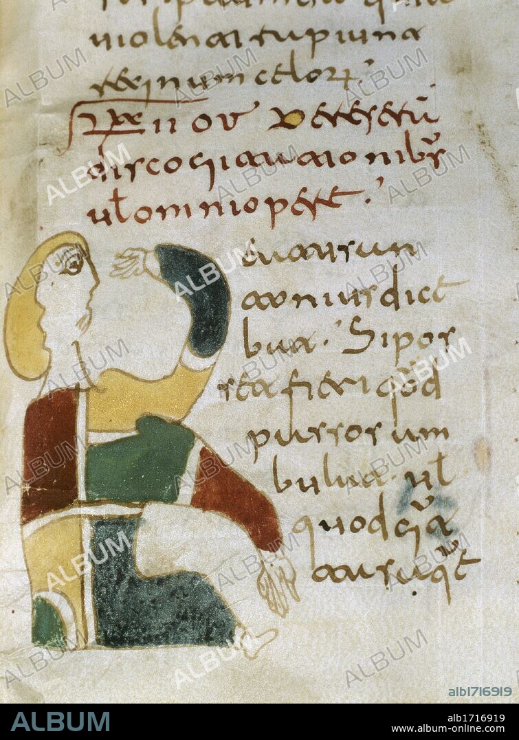 ESCRITURA VISIGODA. SIGLO X. Miscelania Patrística. Escritura visigótica sobre pergamino con iniciales decoradas con figuras humanas y zoomórficas. Podria proceder de algún antiguo monasterio d'Urgell. Archivo Capitular de la Seu d'Urgell. Cataluña.