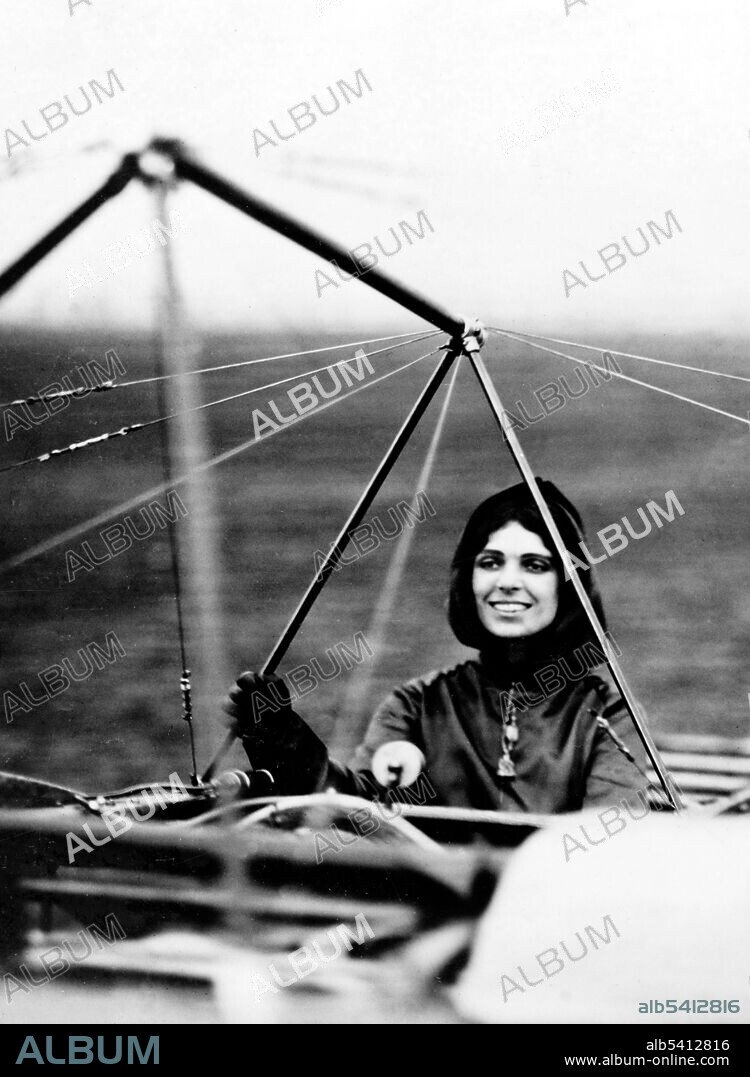 Harriet Quimby (May 11, 1875 - July 1, 1912) was an early American aviatrix and scriptwriter. Quimby became interested in aviation in 1910, when she attended the Belmont Park International Aviation Tournament in Elmont, New York. There she met John Moisant, a well-known aviator and operator of a flight school. In 1911, she was awarded a pilot's certificate by the Aero Club of America, becoming the first woman to gain a pilot's license in the United States. That same year Quimby authored seven screenplays that were made into silent film shorts by Biograph Studios, directed by D. W. Griffith. In 1912, Quimby took off from Dover en route to Calais, and made the flight in 59 minutes., becoming the first woman to pilot an aircraft across the English Channel. Her accomplishment received little media attention, as the sinking of the RMS Titanic the day before consumed the public interest. On July 1, 1912, she flew in the Third Annual Boston Aviation Meet . Quimby flew out to Boston Light in Boston Harbor at about 3,000 feet, then returned and circled the airfield. William A.P. Willard, the organizer of the event, was a passenger in her brand-new two-seat Bleriot monoplane. At an altitude of 1,000 feet the aircraft unexpectedly pitched forward for reasons still unknown. Both Willard and Quimby were ejected from their seats and fell to their deaths. She was 37 years old.