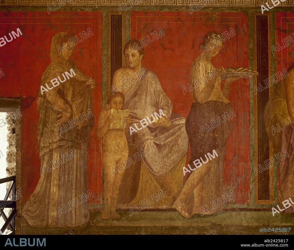 Pompeii. Villa of the Mysteries. Ancient Roman suburban Villa. Frescoes depicting a bride initiating into a Bacchian Mysteries in preparation for marriage. 1st century AD. Dionysian rite is represented: "Catechesis". Dionysius child is the ruler of the ritual of the Initiate (woman in toga on the left). The Initiator (seated) observes. On the right, standing, the offerer with the tray of the "Agape Sacra". Italy, La Campania.
