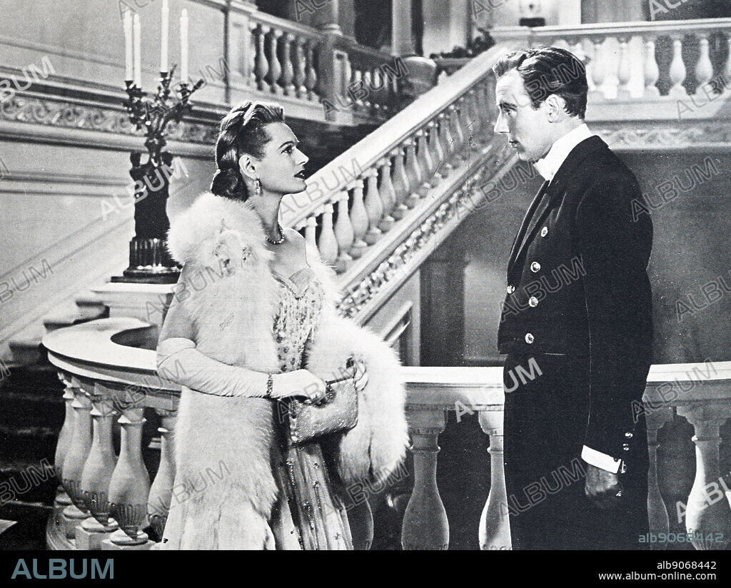 Film still from 'Spring in Park Lane' starring Anna Neagle, Michael Wilding, Nicholas Phipps, and Tom Walls.