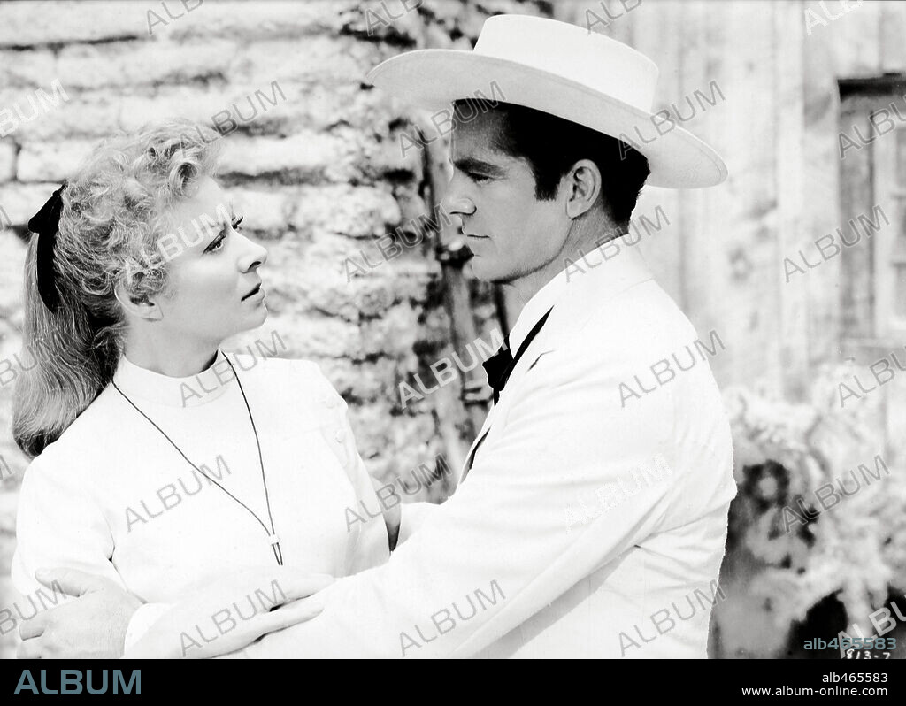 DANA ANDREWS and GREER GARSON in STRANGE LADY IN TOWN, 1955, directed by MERVYN LEROY. Copyright WARNER BROTHERS.