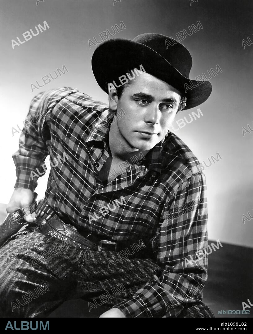 GLENN FORD en LOS DESESPERADOS, 1943 (THE DESPERADOES), dirigida por CHARLES VIDOR. Copyright COLUMBIA PICTURES.