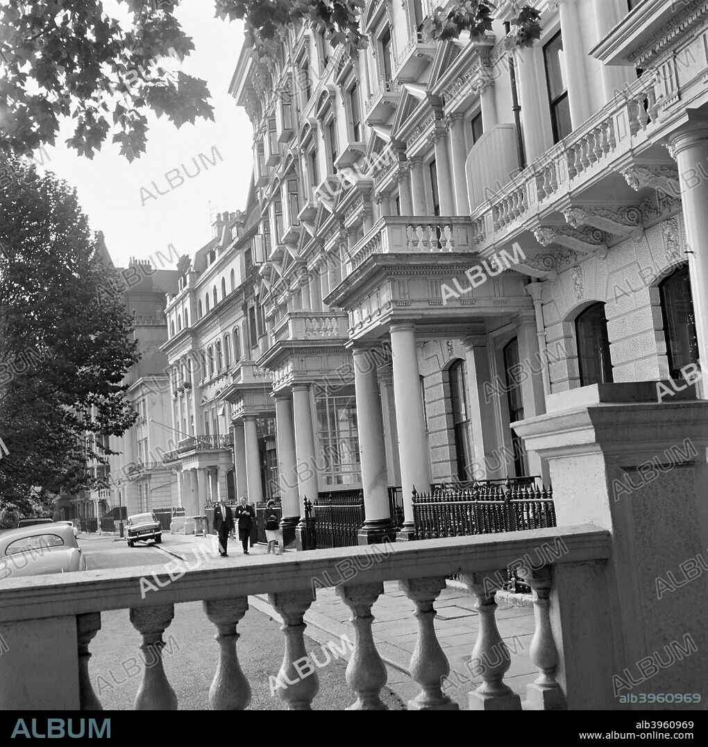 Hyde Park Gate, London, 1962-1964. Exterior of numbers 2 to 8 Hyde Park Gate, Queen's Gate viewed over the balustrade of a neighbouring house.