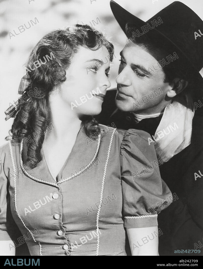 DORIS DAVENPORT and GARY COOPER in THE WESTERNER, 1940, directed by WILLIAM WYLER. Copyright UNITED ARTISTS/SAMUEL GOLDWYN.
