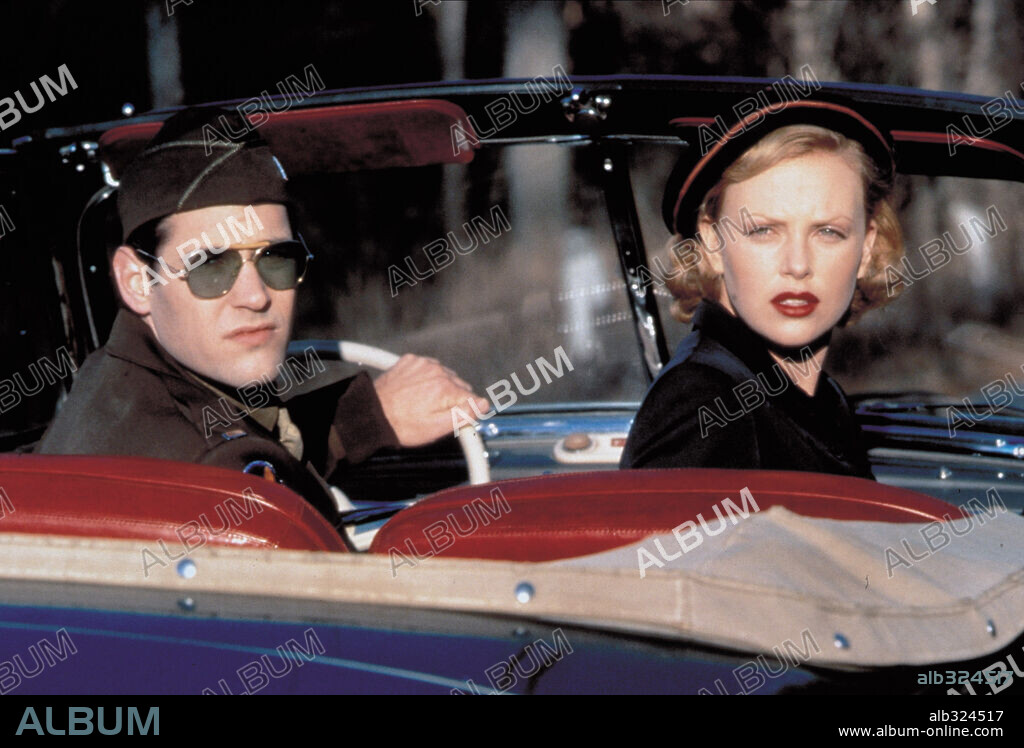 CHARLIZE THERON and TOBEY MAGUIRE in THE CIDER HOUSE RULES, 1999, directed by LASSE HALLSTROM. Copyright MIRAMAX.