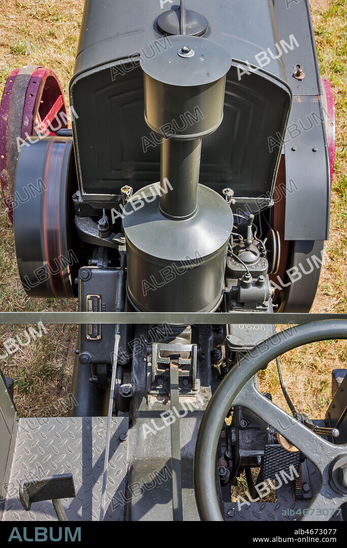 Old Tractor. Detail.. Make: HSCS (Hofherr - Schrantz - Clayton - Shuttleworth). Model: K44-48. Year: 1938 - 1942. Fuel: crude oil and/or diesel oil. Number of Cylinders: . Displacement: about 10.600 cc. Horse Power: 44 HP at the wheel and 48 HP at the PTO (Power Take-Off). Characteristics: 2-stroke diesel cycle. It had been used in the Second World War to pull the cannons, but then it was abandoned because it made too much noise and signaled the vehicle to the enemies.