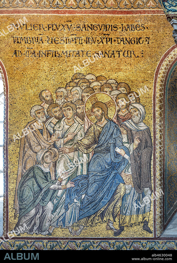 Monreale, Duomo: "Jesus healing the woman suffering from hemorraage", Byzantine mosaic, Episodes from the life of Christ, XII - XIII sec.. Latin inscription:"MULIER FLUXUS SANGUINIS HABENS HMBRIA VESTIMENTA IESU CHRISTI TANGIT ET AB IPSA INFIRMITATE SANATUR" .