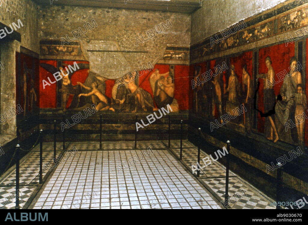 The Villa of the Mysteries, a well-preserved suburban Roman villa on the outskirts of Pompeii, southern Italy, famous for the series of frescos in one room, which are usually thought to show the initiation of a young woman into a Greco-Roman mystery cult. These are now probably the best known of the relatively rare survivals of Ancient Roman painting. Like the rest of the Roman city of Pompeii, the villa was buried in the eruption of Mount Vesuvius in 79 and excavated from 1909 onwards.