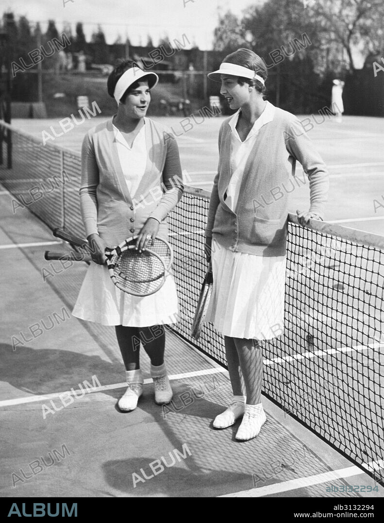 Pasadena, California:  March, 1930 Helen Marlowe, left, with Helen Wills Moody, after their match at the annual Huntington  Invitational Tennis Tourneyament. Mrs. Moody won the title.