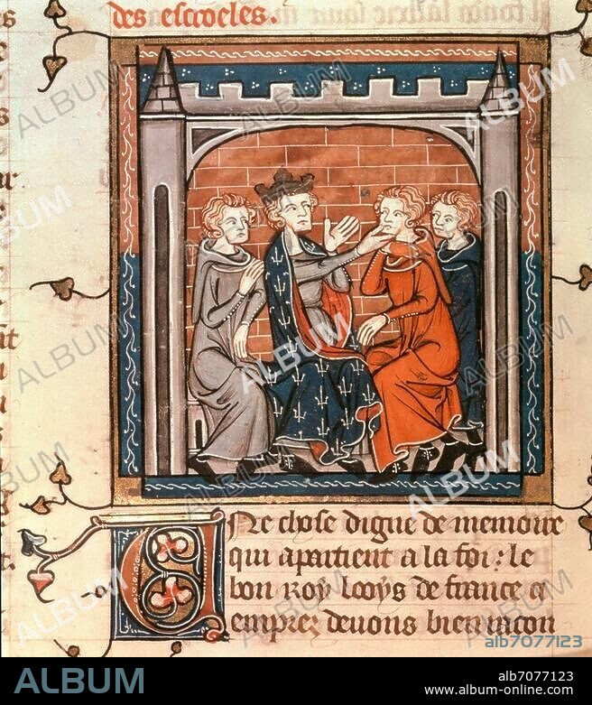 Louis IX (saint Louis) ; roi de France. (1226-1270) ; 1214-1270. Saint Louis guérit les écrouelles. Enluminure française, v. 1335/40. In : Grandes Chroniques de France. Ms. Royal 16, G VI, fol. 424 v, London, British Library.