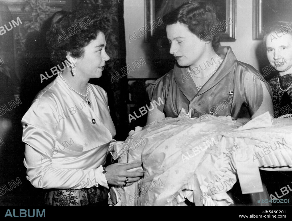 Queen Of Greece is Godmother - Queen Frederika of Greece (left), with Princess Ortrud of Sonderburg-Gluecksburg, who is holding her six-weeks-old daughter, Princess Frederika Louise, who was Christened at Marienburg Castle, residence of the Duke of Brunswick, the father of Queen Frederika and of Prince Ernst August Of Hanover, father of the child. Queen Frederika who was last in Germany in the Autumn of 1951 at the wedding of her brother, Prince Ernst August to Princess Ortrud, was the child's godmother. January 8, 1953.